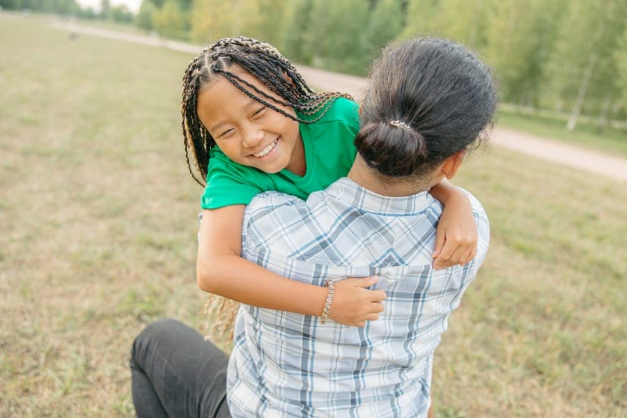 A child playing with a parent