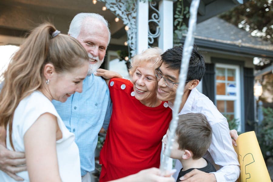 Multiple generations of a family posing for a photo