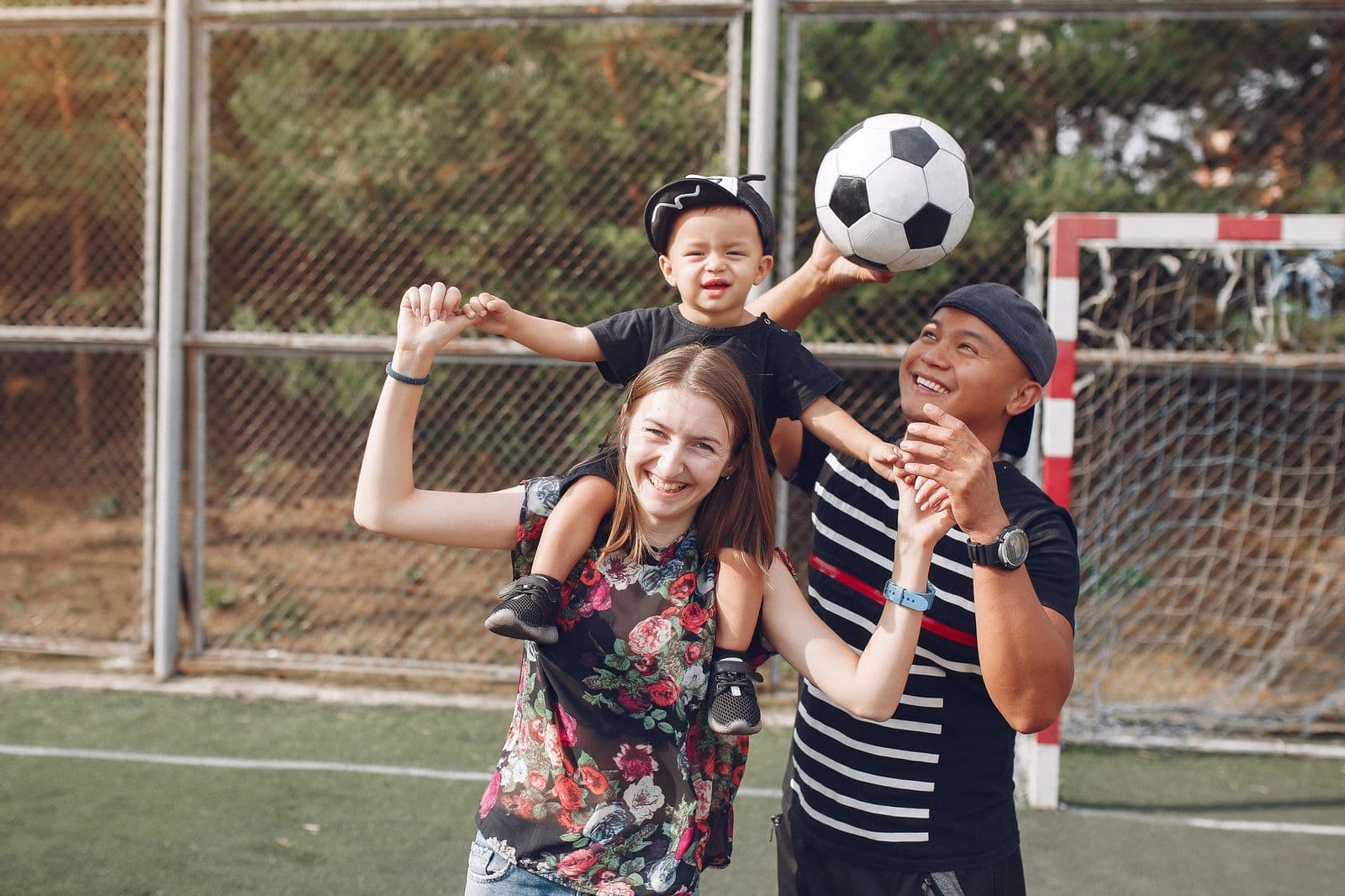 A family cheering together at an event