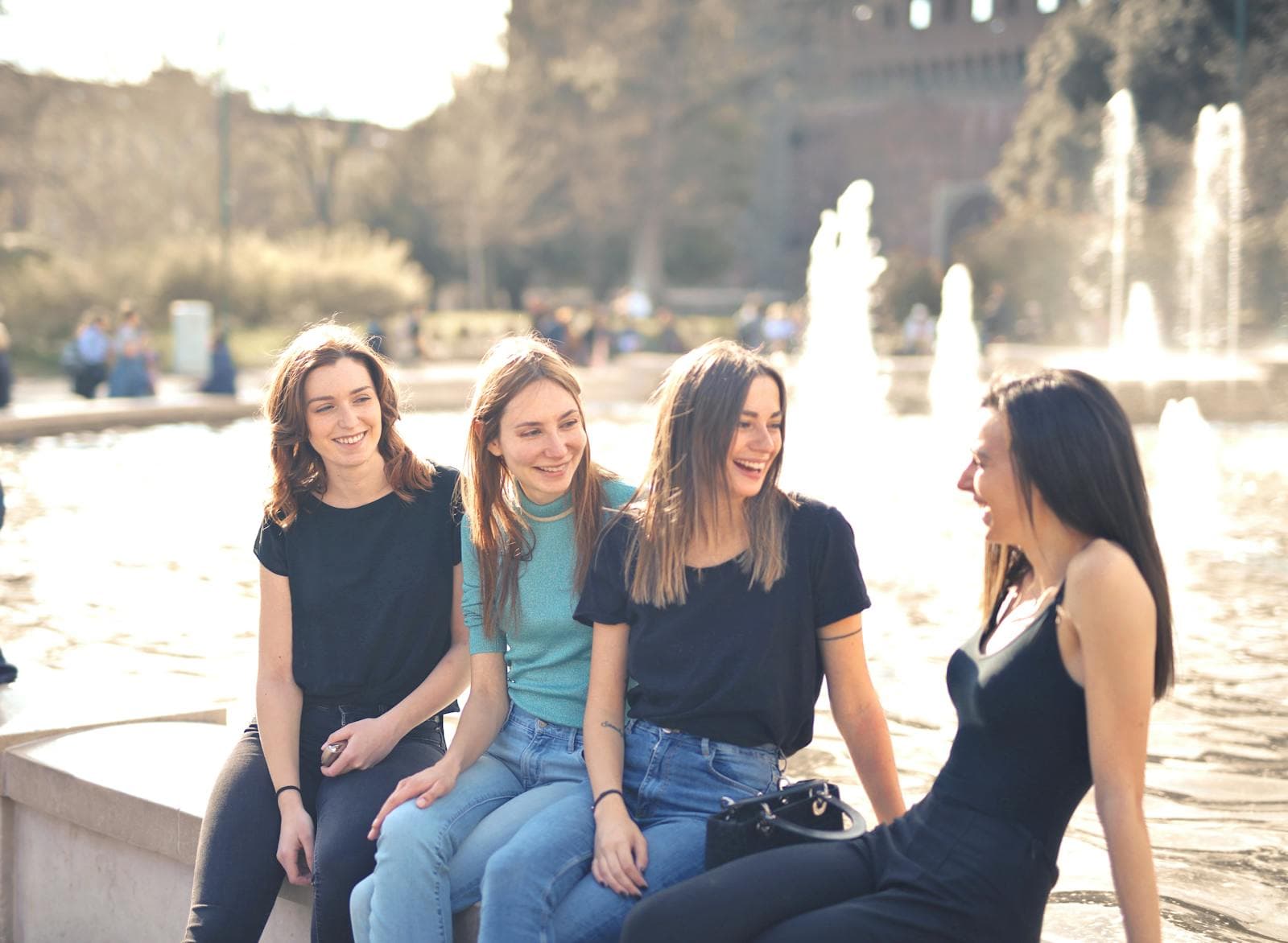 A close group of friends laughing together