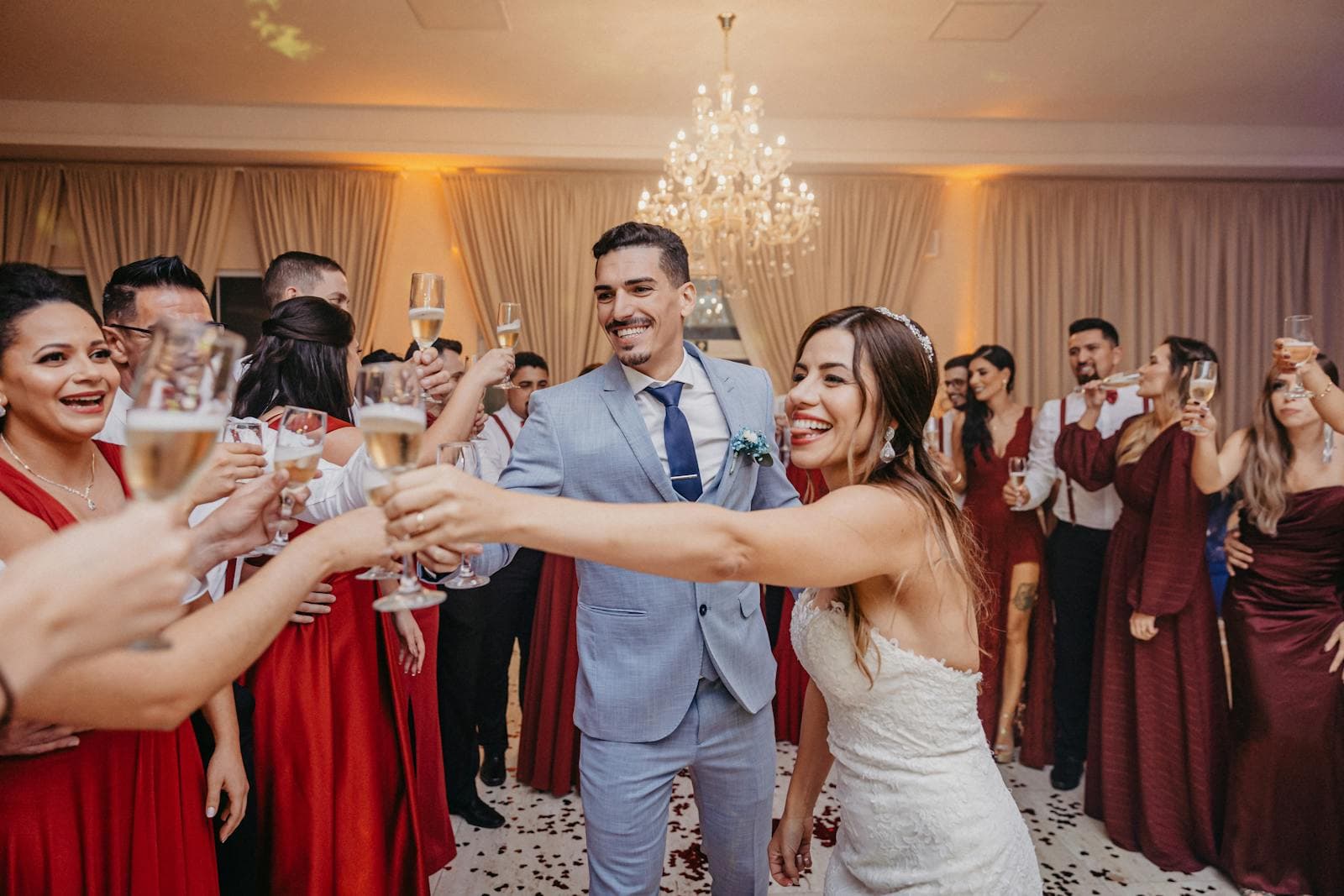 A couple and their family celebrating at a wedding